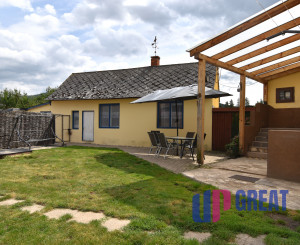 Rodinný dom s veľkou záhradou a potenciálom v obci Sološnica