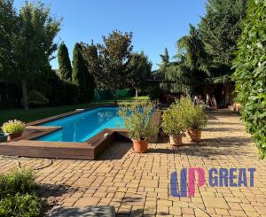 Na predaj 5-izbový rodinný dom s veľkorysou záhradou a bazénom v Podunajských Biskupiciach