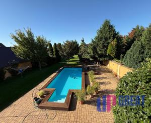 Na predaj 5-izbový rodinný dom s veľkorysou záhradou a bazénom v Podunajských Biskupiciach