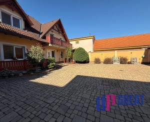 Na predaj 5-izbový rodinný dom s veľkorysou záhradou a bazénom v Podunajských Biskupiciach