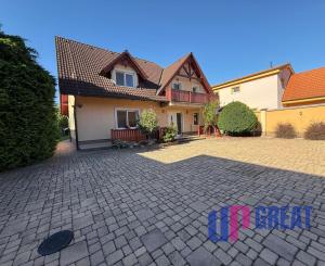 Na predaj 5-izbový rodinný dom s veľkorysou záhradou a bazénom v Podunajských Biskupiciach