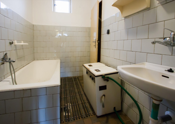 Na predaj investičný rodinný dom s veľkým pozemkom v Okoči