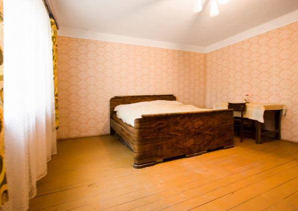 Na predaj investičný rodinný dom s veľkým pozemkom v Okoči